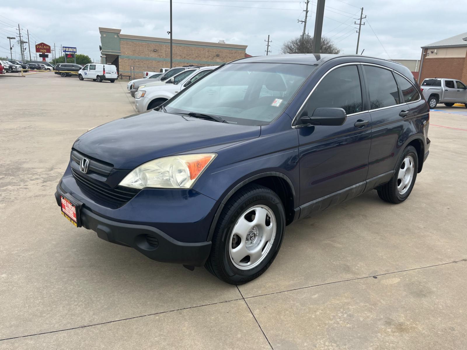 2008 blue /black Honda CR-V LX 2WD AT (3CZRE38348G) with an 2.4L L4 DOHC 16V engine, 5-Speed Automatic Overdrive transmission, located at 14700 Tomball Parkway 249, Houston, TX, 77086, (281) 444-2200, 29.928619, -95.504074 - Photo #2